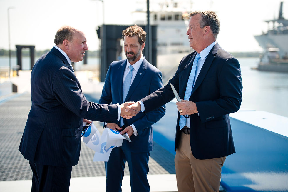 Manson Vice President and Gulf & East Coast Civil Area Manager Mark Openshaw (far right) receives congratulations from U.S. Deputy Secretary of Commerce Paul Dabbar (far left) and the Director of the National Oceanic and Atmospheric Administration (NOAA) Dr. Neil Jacobs (center).