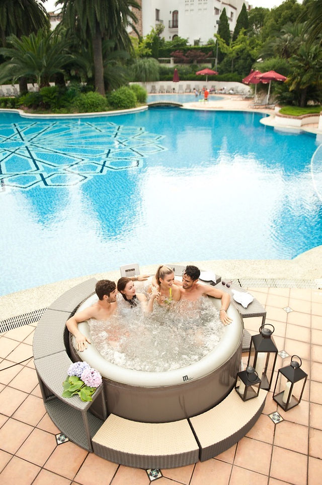 Inflatable hot tub Mspa Reve JB-301 beside pool