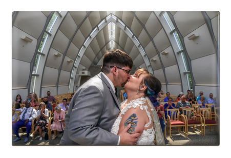 man and a woman kissing