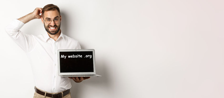 man with laptop scratching his head confused about his web design