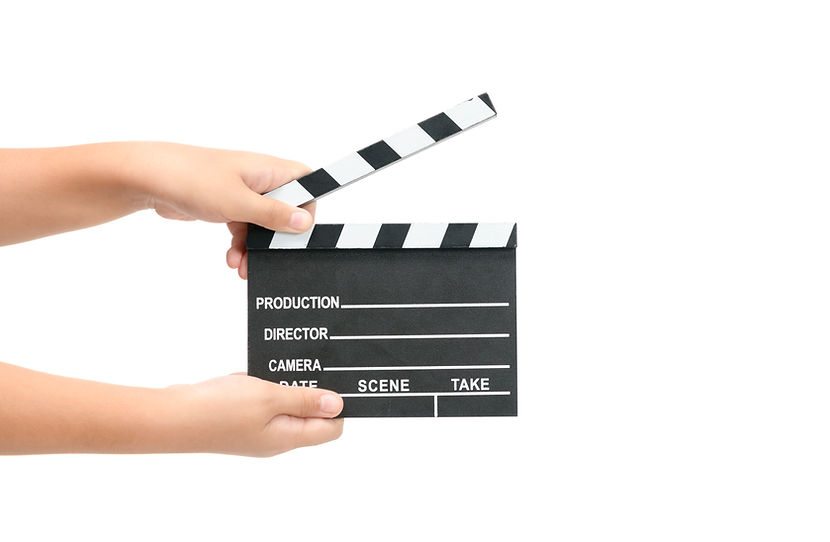 Little girl holding movie clapper isolated on white background, cinema concept.jpg