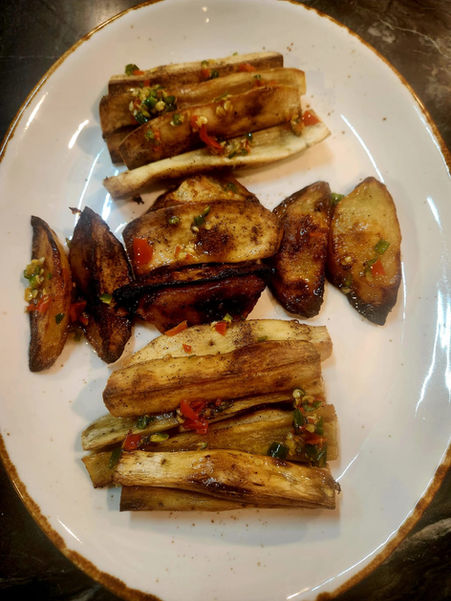 Lebanese roasted potatoes with green and red chilli sauce
