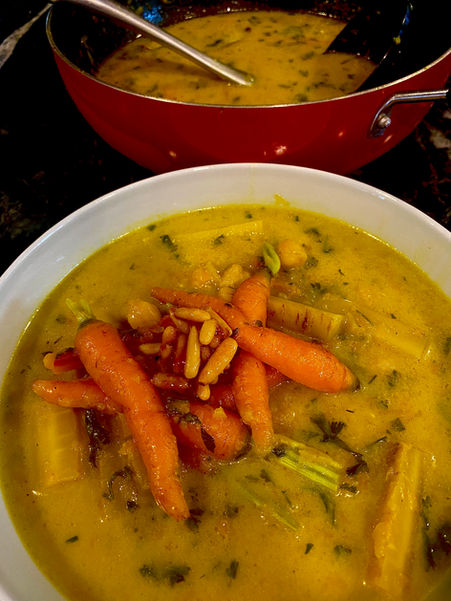 Baby carrot tagine with yoghurt and honeyed pine nuts