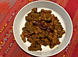 Sweet and spicy bitter gourd stir-fry (Kakarakaya vepudu)
