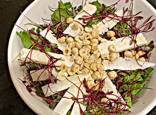 Microgreens salad with hazelnuts and pecorino (Insalata misticanza)