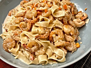Fettuccine with carrots and prawns (Fettuccini alle carote e scampi)