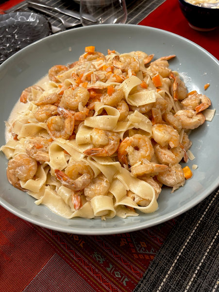 Fettuccine with carrots and prawns (Fettuccini alle carote e scampi)