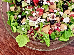 Melon, blueberry, and feta salad with ginger and mint.