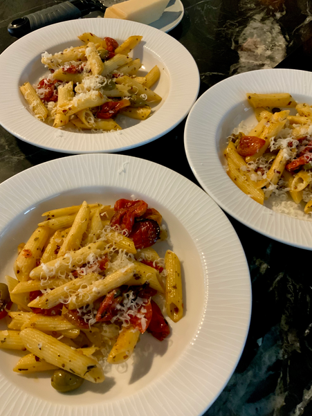 Penne with oven-dried tomatoes, olives and herbs