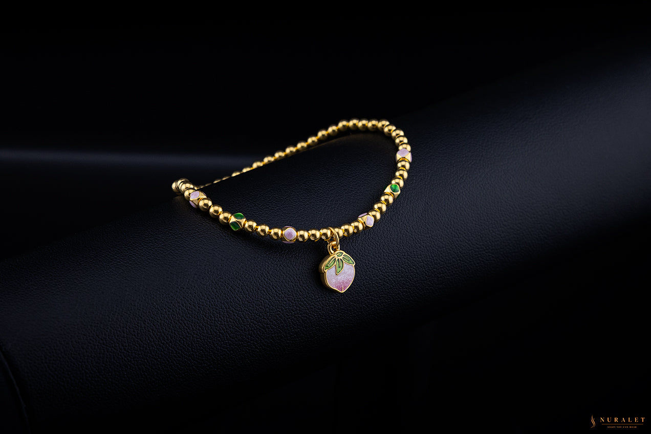 Strawberry charm beaded bracelet in 24k gold