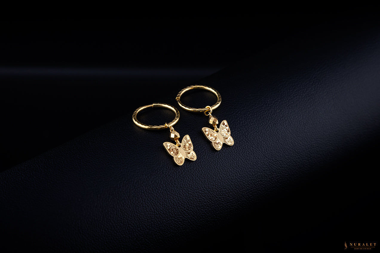 Butterfly charm hoop earrings in 24k gold
