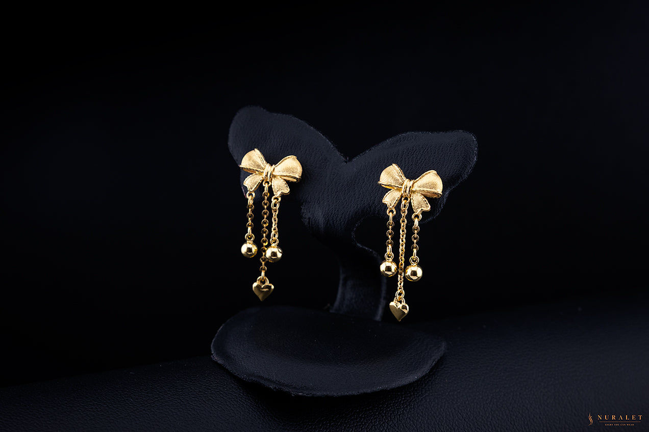 Dangle bow earrings in 24k gold