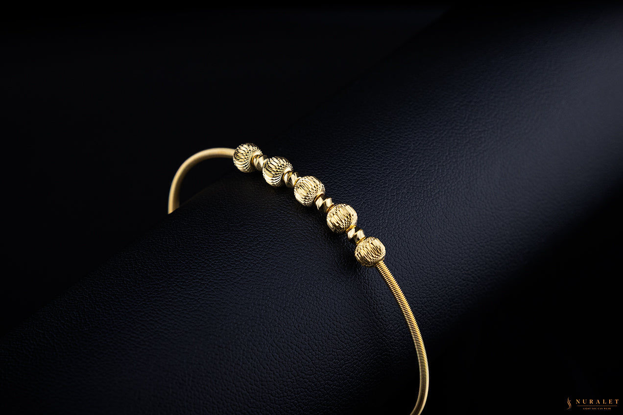 Beaded snake bangle in 24k gold