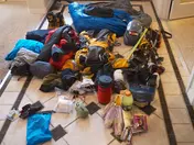 A pile of camping gear, unorganized
