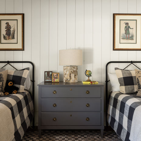 Hunting lodge located in Blackstock, SC, luxury hunting cabin. Bedroom with white walls and wood ceiling