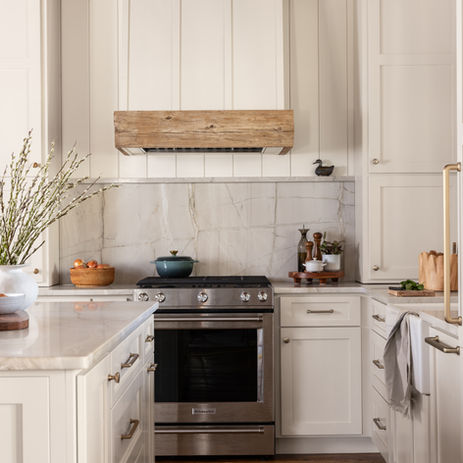 Custom kitchen with hardwood floors and wood ceilings, white cabinets. Custom home in Blackstock SC