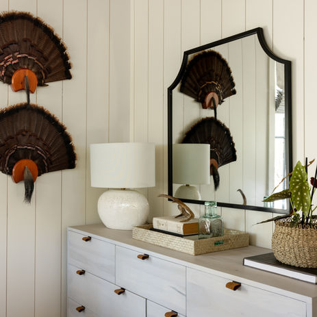 Hunting lodge located in Blackstock, SC, luxury hunting cabin. Bedroom with white walls and wood ceiling