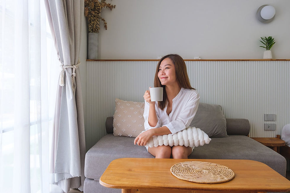 Woman drinking hot coffee