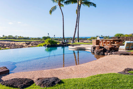 Walk in sand entrance pool at Hualalai vacation rental home with ocean view