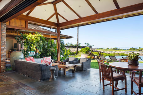 Outdoor sitting area on lanai of Hualalai vacation rental home with ocean view