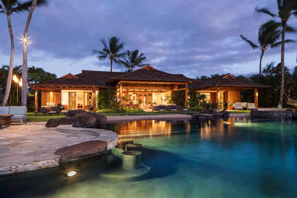 Sunset shot of beautiful 5 bedroom home at Hualalai vacation rental home with ocean view