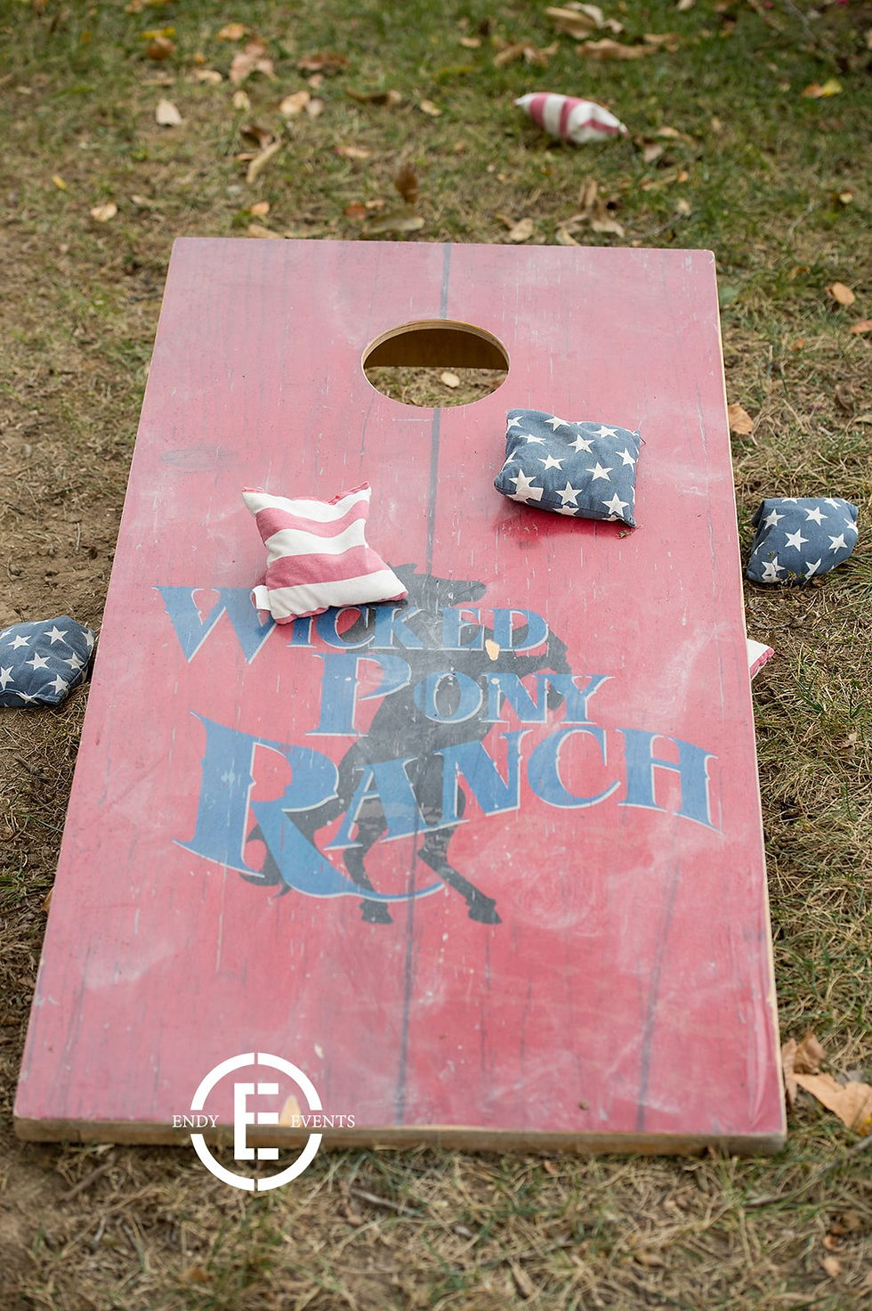 A game of corn hole played at our outdoor wedding venues in St. Louis