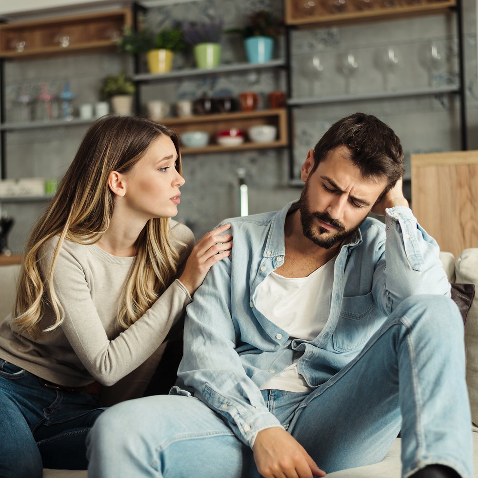 Women with her hand on a mans shoulder representing emotional support, people-pleasing, relationships, and healthy boundaries.
