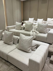 Tiered home theater sofas with throw pillows
