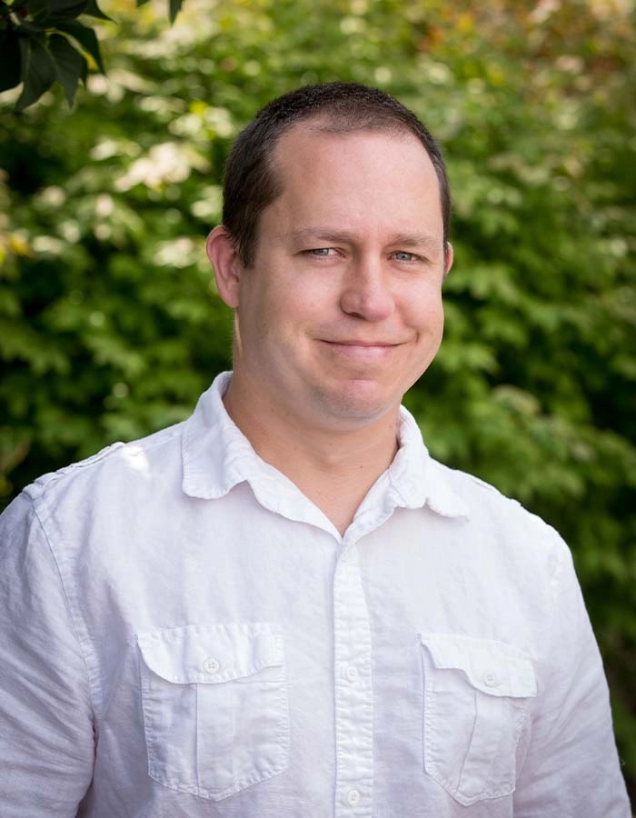 COREY-MAY-STAFF.webp