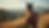 Eye-level view of a majestic horse standing on a scenic trail