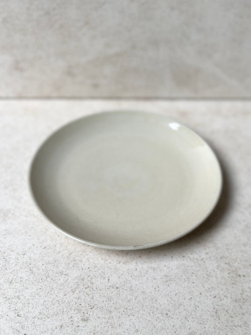 Thumbnail: Rutunda handmade ceramic Plates in Dotted Clay