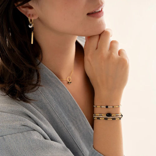 Thumbnail: A Beautiful Story Clever Bracelet in Black Onyx +  Gold available from Iris Lifestyle Cambridge UK