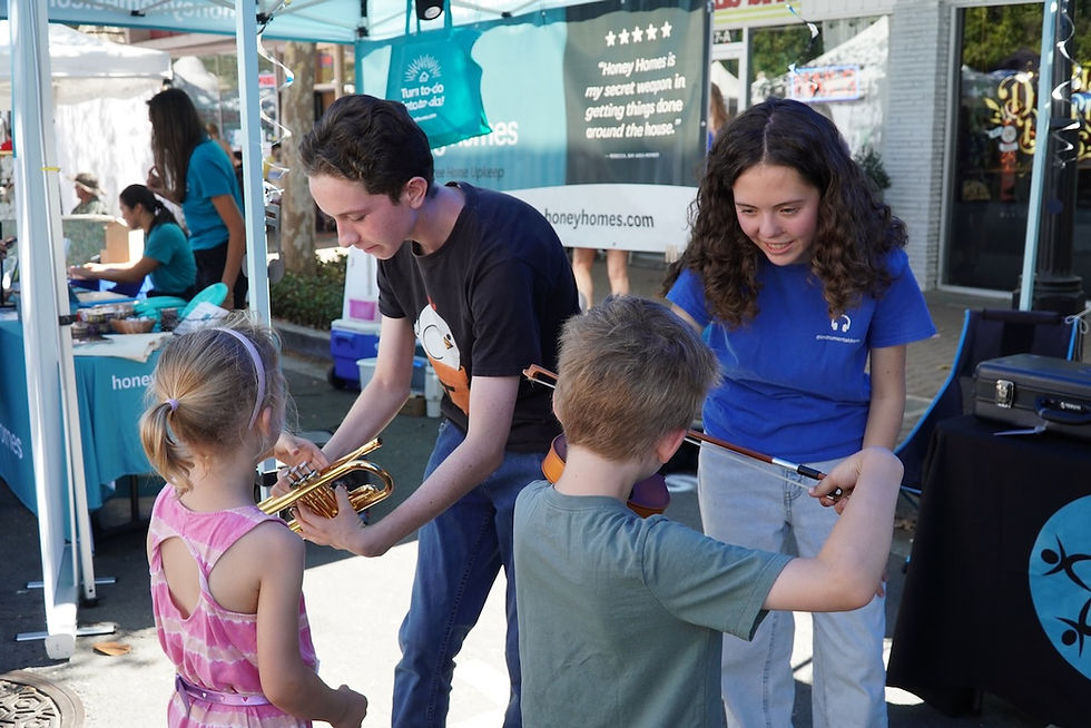 Melody Music Outreach Celebrates Record Turnout at Instrument Petting Zoo