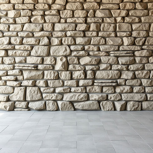 a stonewall with concrete pavement on the floor_edited.jpg