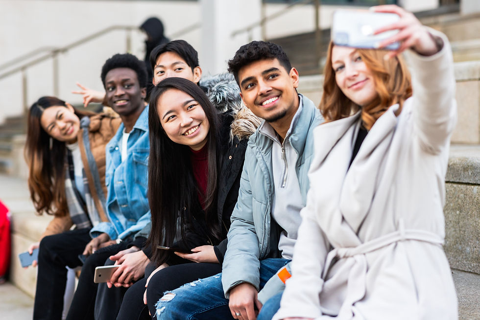 multiracial-people-taking-a-selfie-together-and-ma-2025-01-08-23-07-53-utc.jpg