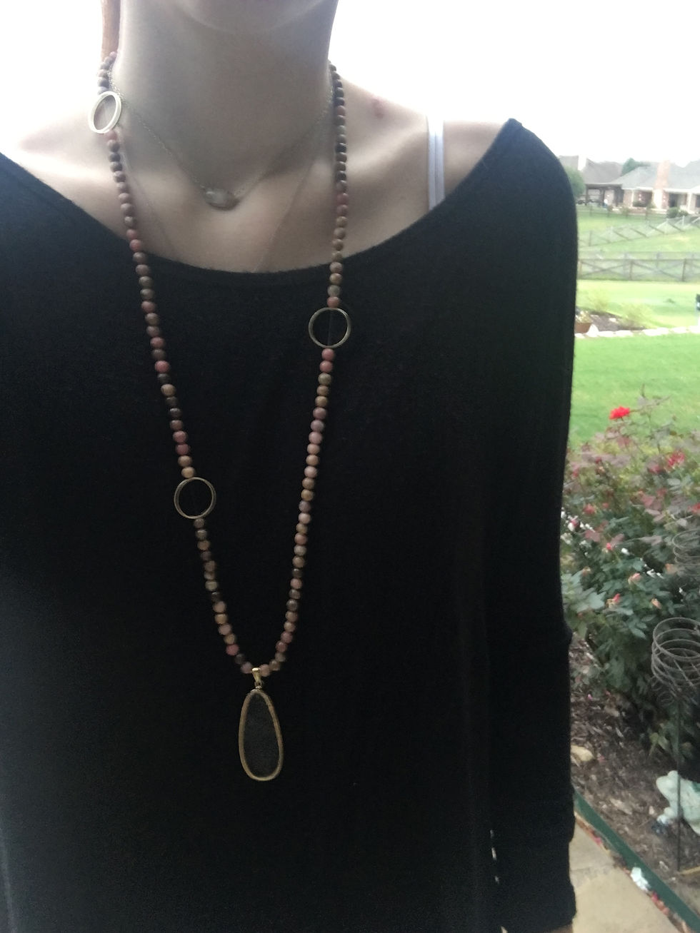 Thumbnail: pink rock beads and clear stone