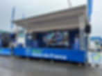 Camion podium 60 m2 équipé de loges et écran géant à leds