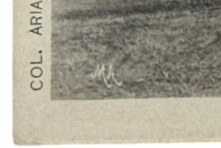 Vintage photo detail with text COL. ARIA and signature.