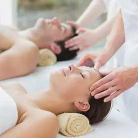 Guest enjoying in-room relaxing massage service at Maison Fleur Boutique Hotel