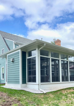 Remodel including sunroom, kitchen, & finished basement with home gym