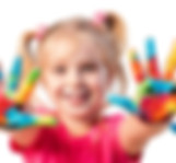 preschooler with painted hands.jpg