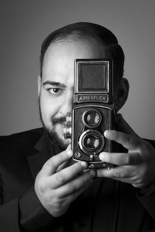 Professional portrait of Andres Galvez, founder of Galvez Photography, an Orange County photographer specializing in corporate events, private celebrations, professional headshots, and portraits throughout Southern California.