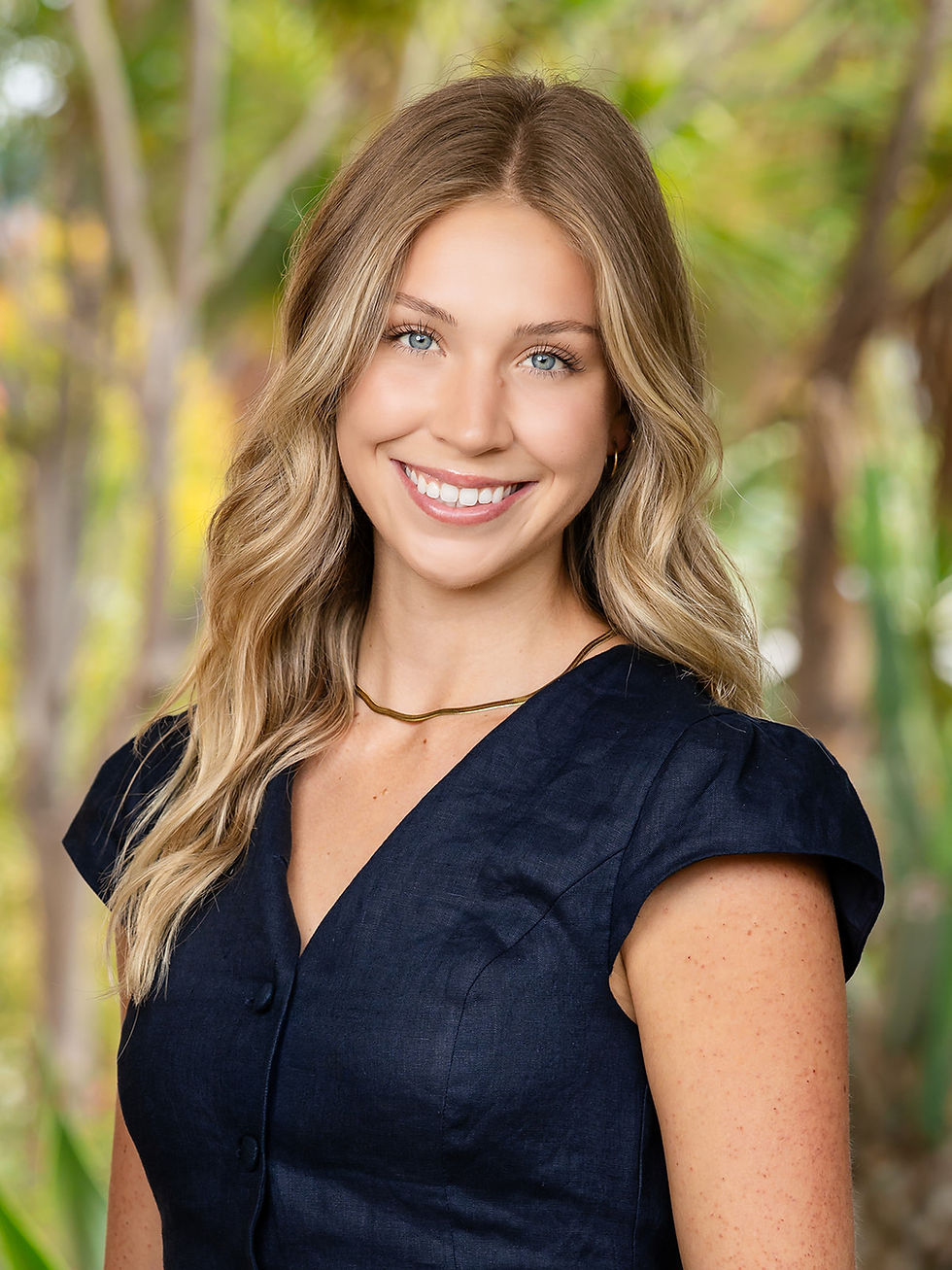 Professional student headshot photographed by Galvez Photography, showcasing how to prepare for professional headshots with appropriate attire and a confident, natural smile.