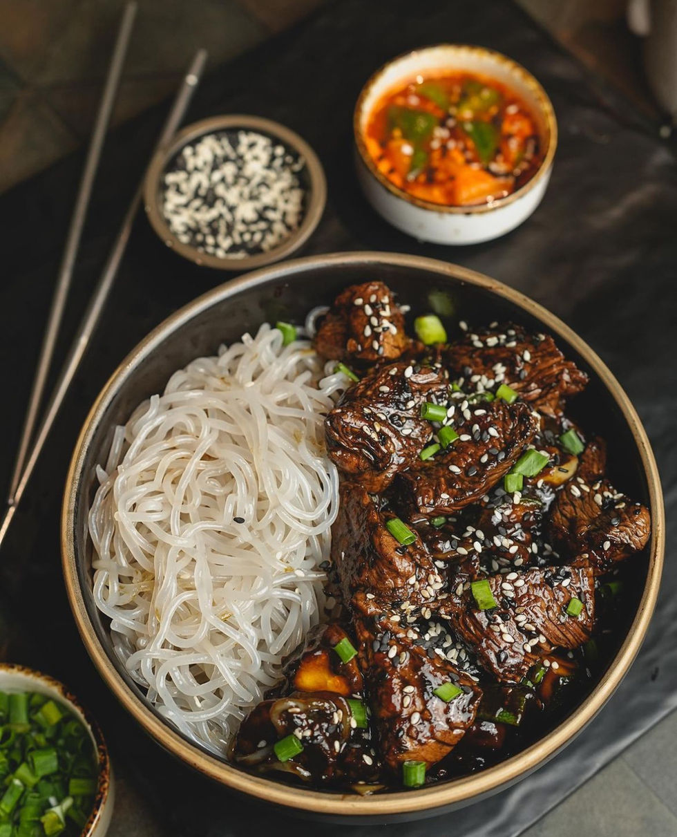 Styled food photography featuring a vibrant, colorful dish with rich textures and natural lighting.