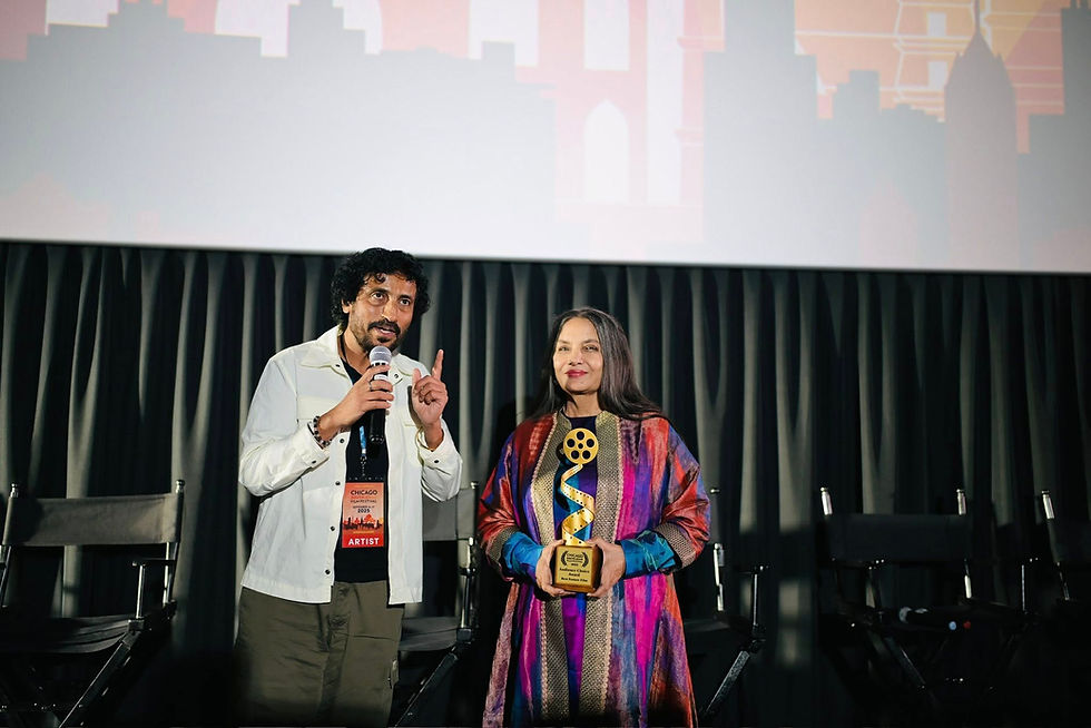 Filmmaker Vinod Kapri receives the Best Film Audience Award from renowned Indian actor Shabana Azmi. (Photo courtesy: Vinod Kapri)
