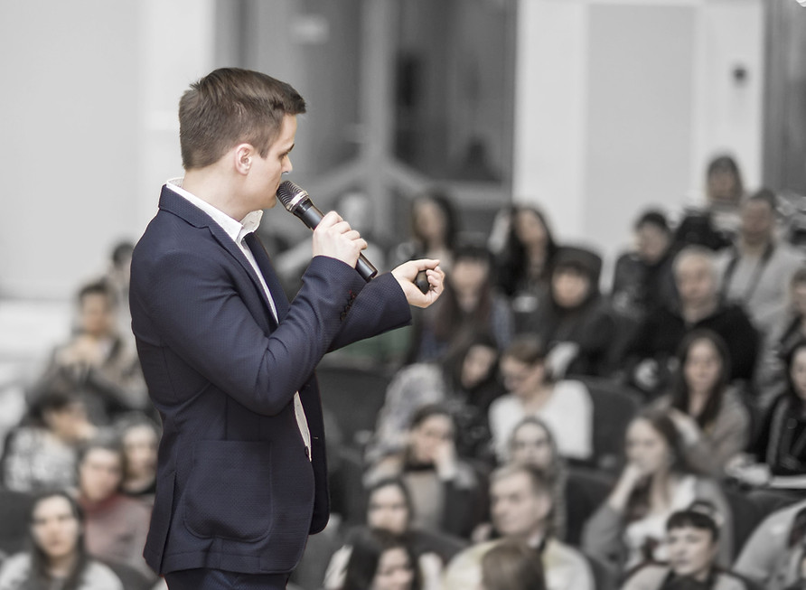 successful-businessman-holds-business-conference-press (1)-min.jpg