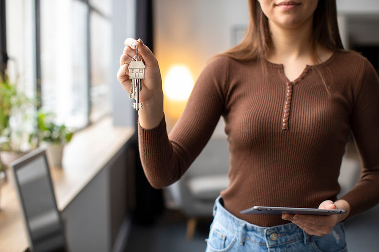 front-view-woman-holding-keys.jpg