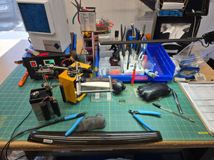 Jarvis Canada’s mesh repair bench — where precision tools and skilled hands restore stainless-steel gear to like-new condition.