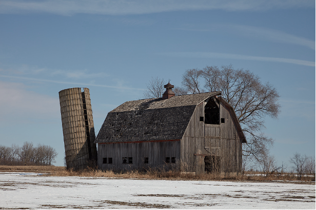 "One's Life Does Not Consist in an Abundance of Possessions". Abandoned silo and barn outide Sycamore, IL (Carol M. Highsmith)
