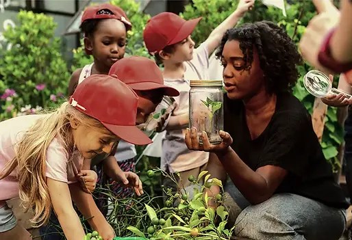 Give to LA - Combined Charitable Campaign - Educator and Kids in Garden copy.webp